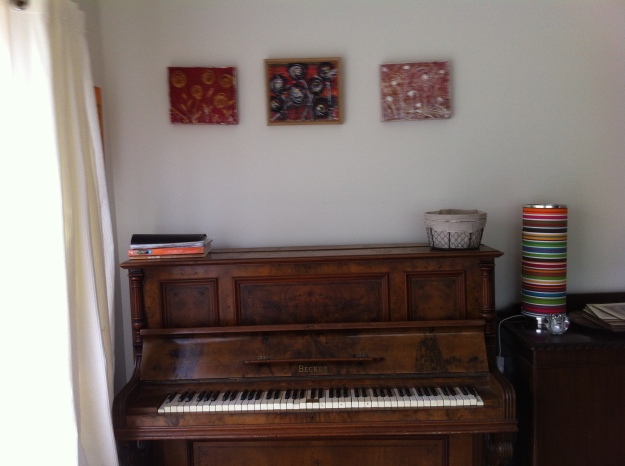 paintings over piano